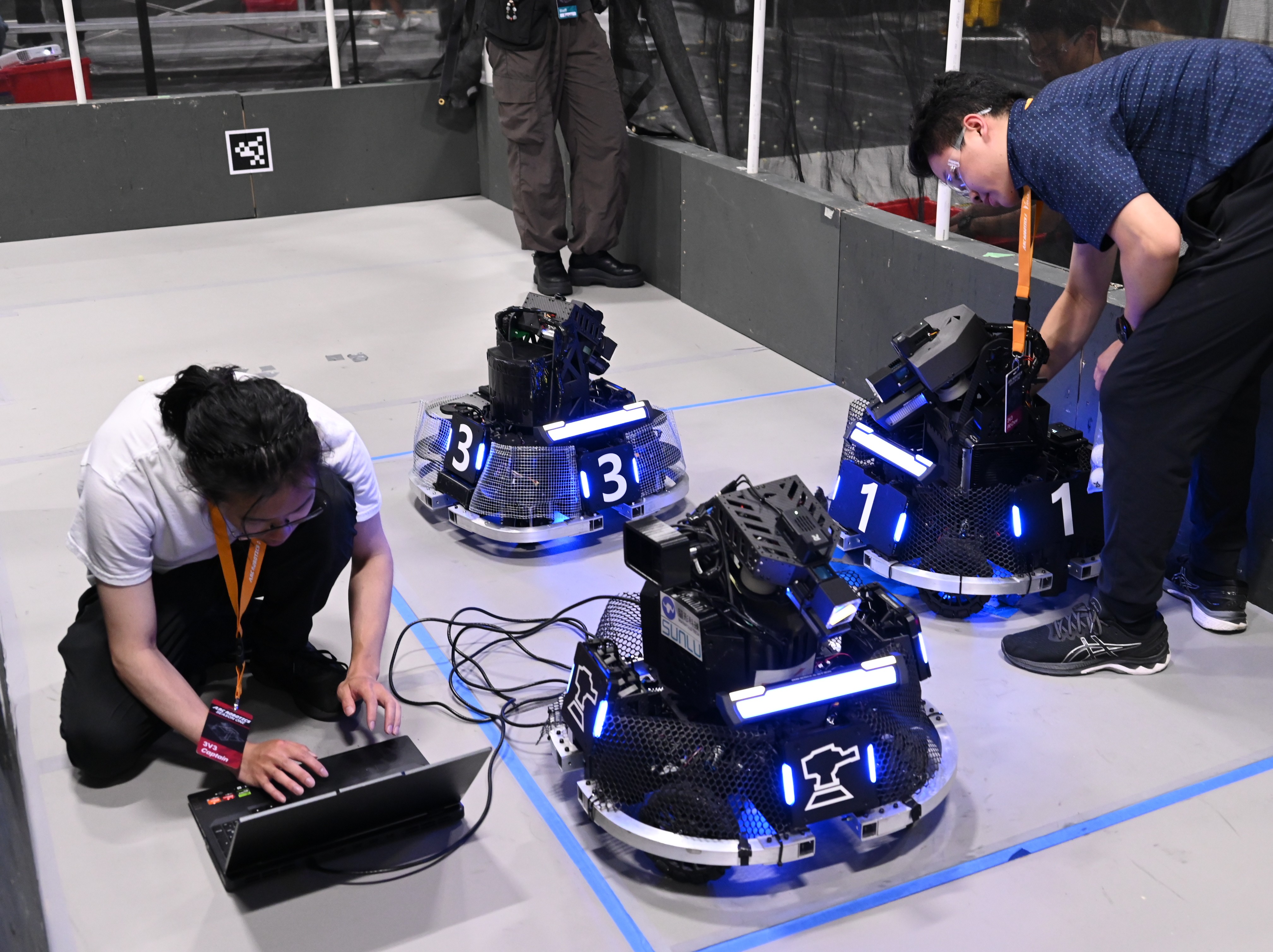Field tuning beside two ARCC 2026 robots