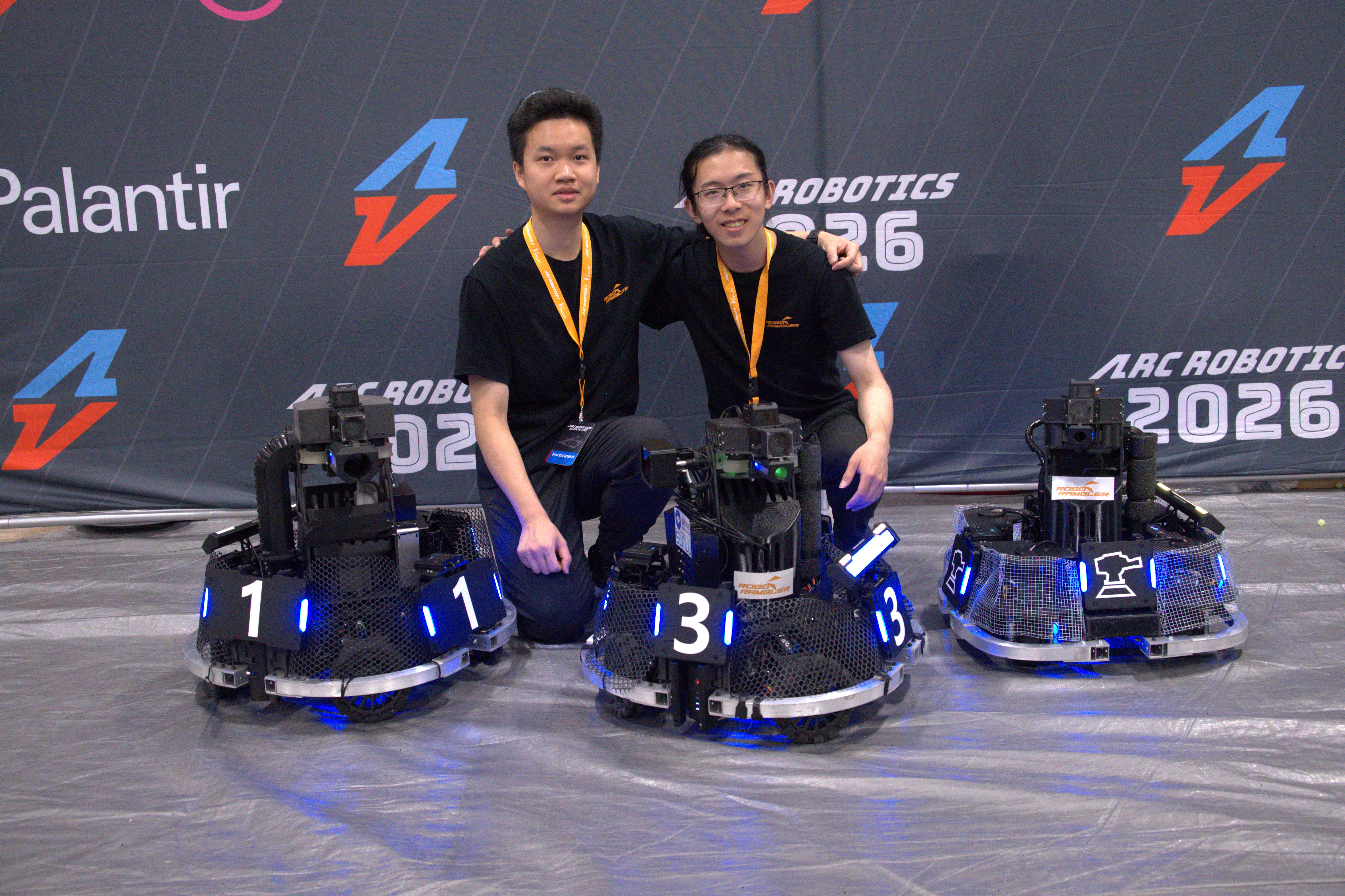 Team members with the ARCC 2026 robot fleet