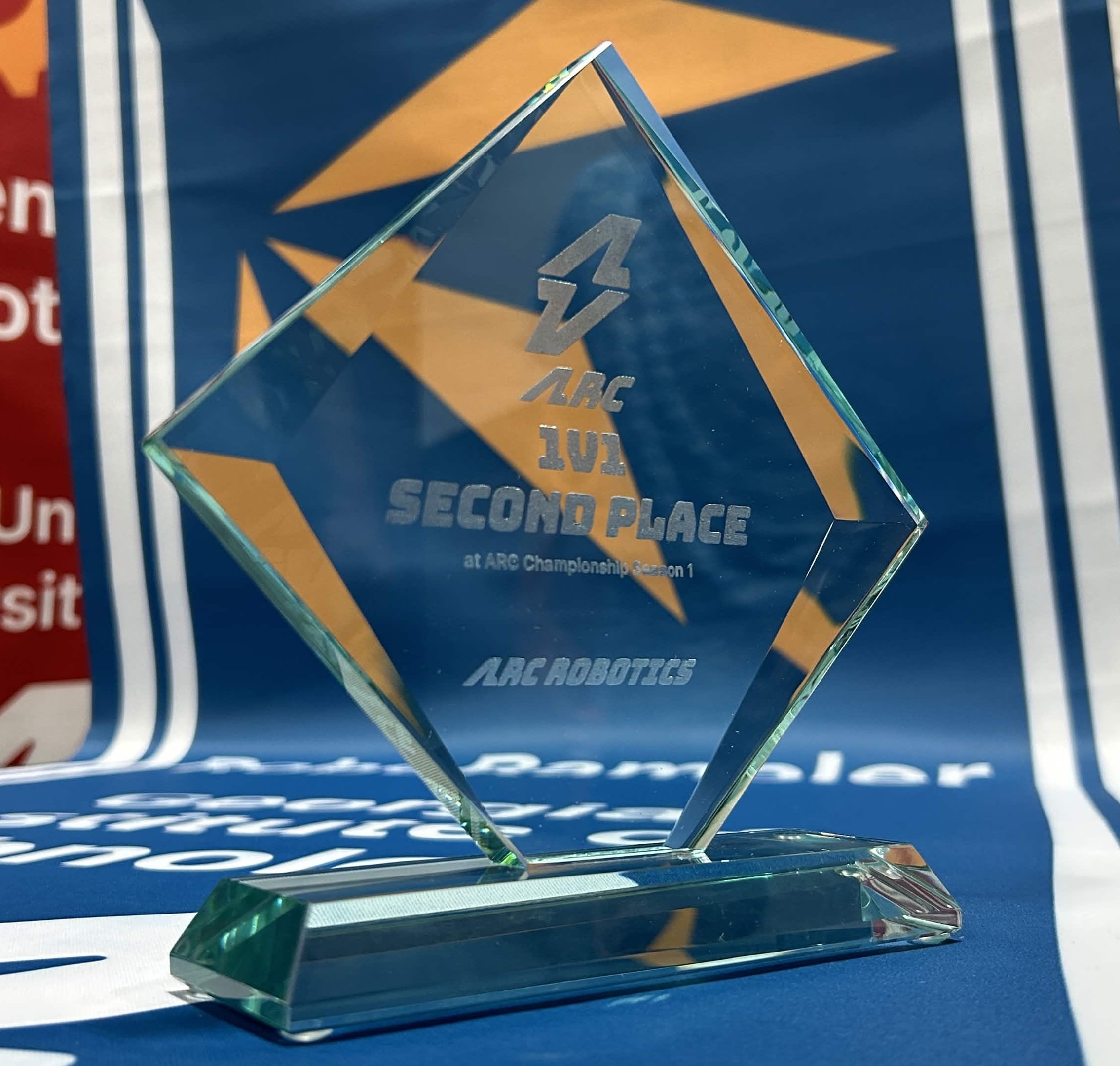 Second place trophy in front of RoboRambler banner