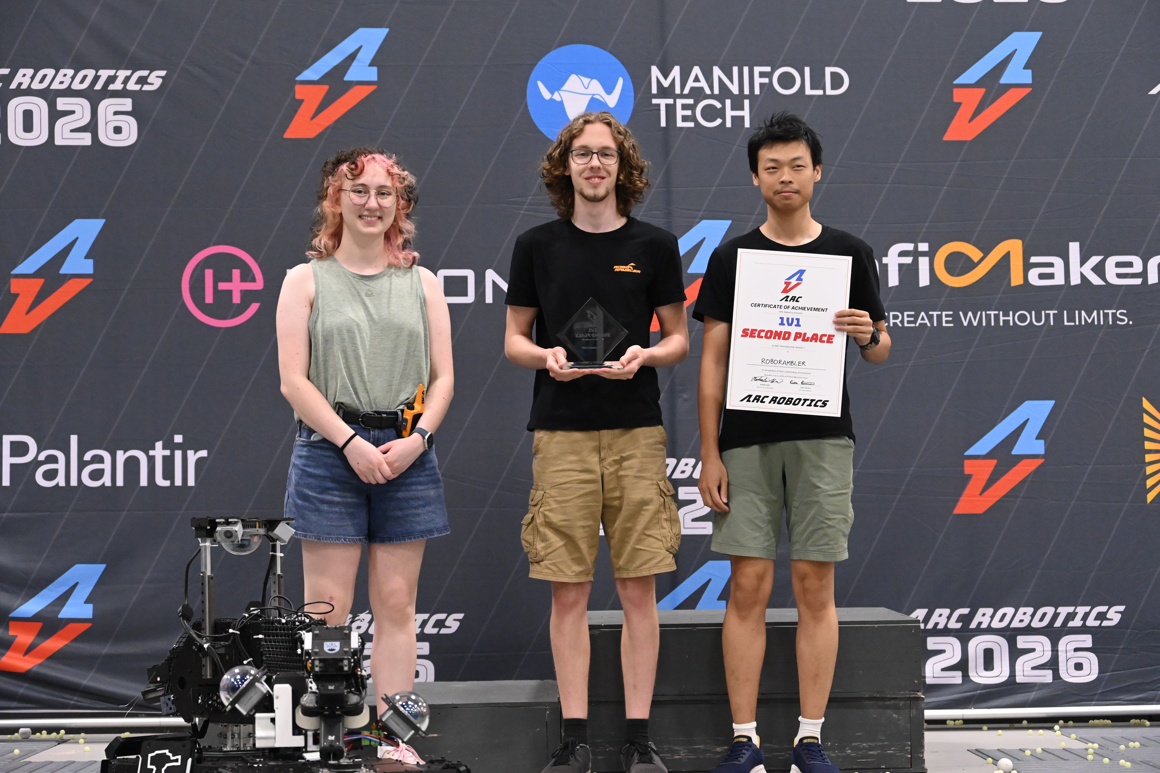 ARCC 2026 driver with the trophy